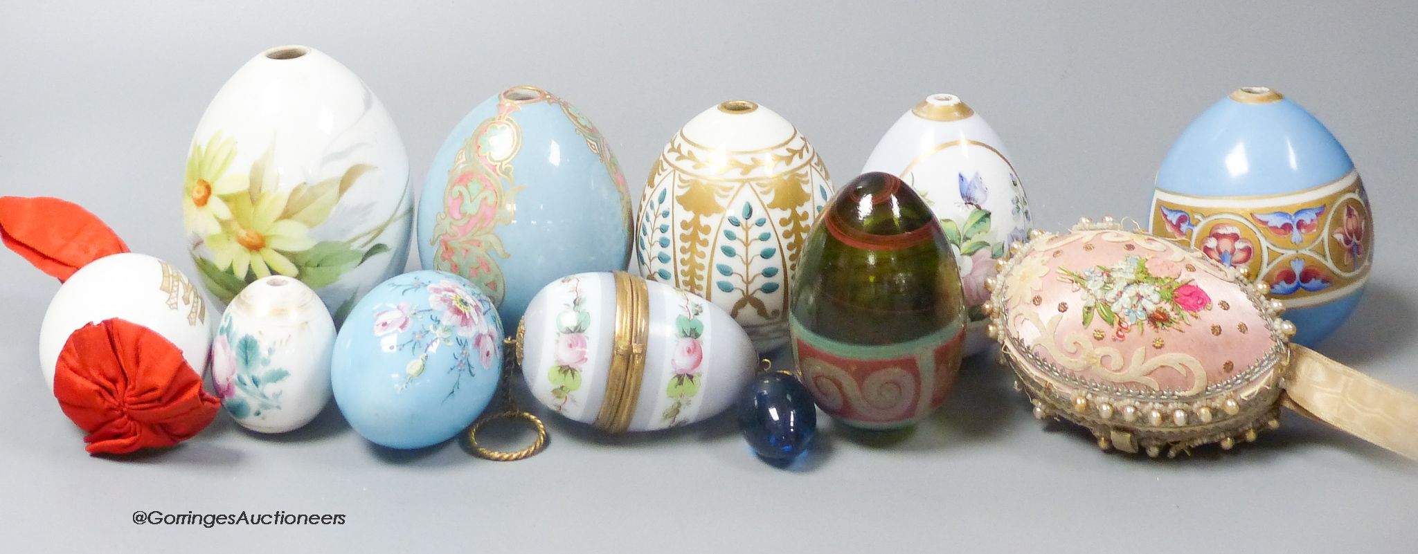 Assorted 19th/20th century Russian painted and gilded porcelain Easter eggs